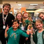 Photo courtesy of Five Acre School/ NOLS Librarian Charlotte McGrew stands with Five Acre Schools Team Kiwis, from second left, Emma Tran, Cascadia Cammett, Miles Taylor, Norah Madjdi-Pickett and Spencer Armstrong after they won the 2023 Battle of the Books.
