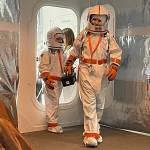 Sequim Gazette photo by Matthew Nash/ Third graders Vaughn McCarter, front, and Eden Kulfan walk onto Mars (Michele Canepas classroom) for the first time to build and place a weather station.