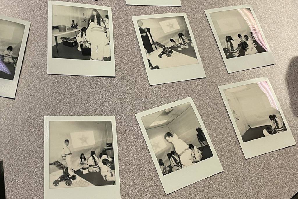 Sequim Gazette photo by Matthew Nash/ Polaroids capture moments of the Olympic Peninsula Academys Vulta V flight to Mars on March 27.