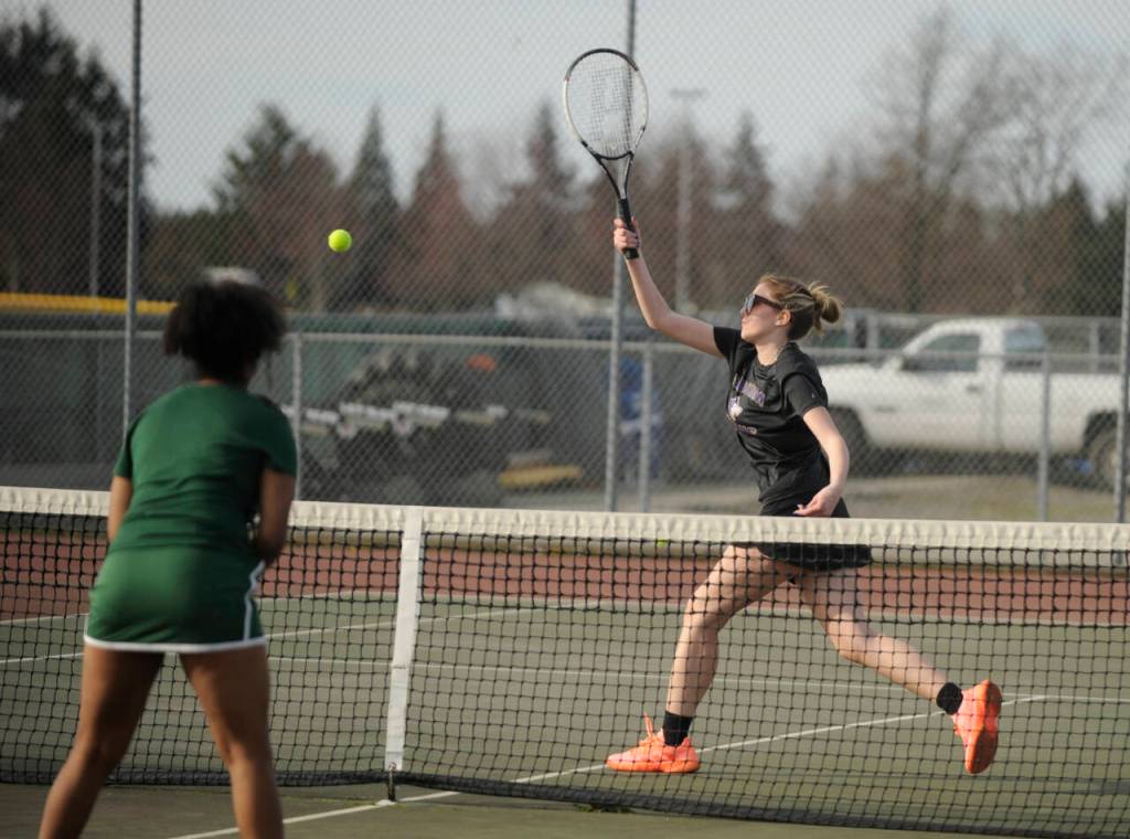 Sequim Gazette photo by Michael Dashiell / Sequims Payton Smithson returns a shot in a March 29 match against Port Angeles. She and doubles partner Amara Gonzalez topped Kayla Jones and Bridget Weed, 6-3 and 6-1, and the Wolves won the match, 7-0.