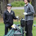 Photo by Keith Thorpe/Olympic Peninsula News Group / Sequims Carter Cronin, left, and Cole Smithson wait to tee-off on the first hole at Peninsula Golf Course on March 30 in Port Angeles.