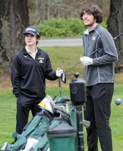 Photo by Keith Thorpe/Olympic Peninsula News Group / Sequims Carter Cronin, left, and Cole Smithson wait to tee-off on the first hole at Peninsula Golf Course on March 30 in Port Angeles.