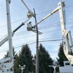 Photo courtesy of Clallam County PUD / Crews from Clallam County Public Utility District work to restore power last week. About 1,300 Clallam County PUD customers lost power at 2:30 a.m. on March 30 after a car hit a pole at Elizabeth Lane and Old Olympic Highway.