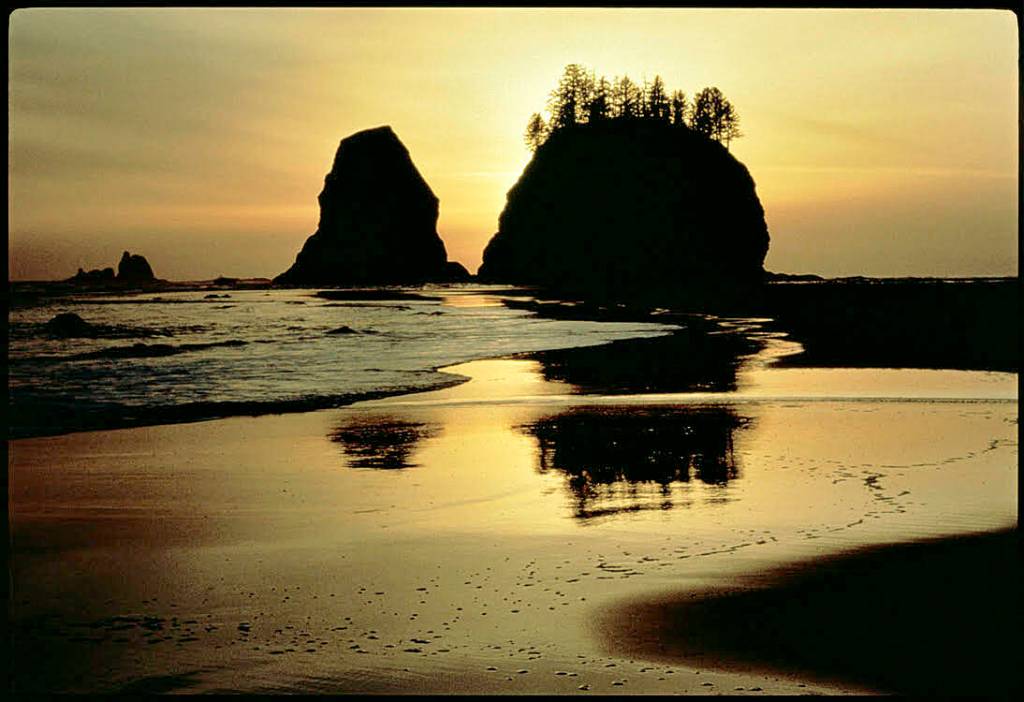 Photo by Ross Hamilton / Sunset from Second Beach, a photo featured in Ross Hamiltons annual The Olympic Peninsula calendar in 2019.