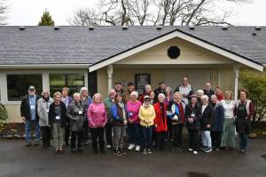 Sequim Gazette photo by Michael Dashiell / Members of the Sequim Prairie Garden Club gather outside the recently renovated clubhouse at Pioneer Memorial Park in early April. The club hosts its major fundraiser, the annual plant sale, from 9 a.m.-1 p.m. on Saturday, May 6, at the park, 387 E. Washington St.