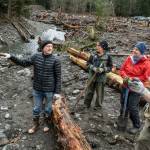 Photo by Charles Espey/North Olympic Salmon Coalition. Volunteers with the North Olympic Salmon Coalition gather to learn about the Caldero Side Channel Project. The coalition hosts a mulching party at April 22.