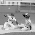 Sequim Gazette photo by Michael Dashiell / Bryan Laboy, left, looks to put the tag on Port Angeles Colton Romero in the third inning of an Olympic League match-up on April 13. The Roughriders scored five innings en route to a 12-2 win in Sequim.