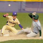 Michael Dashiell/Olympic Peninsula News Group
Sequim's Bryan Laboy, left, looks to put the tag on Port Angeles' Colton Romero in the third inning of an Olympic League match-up on April 13. The Roughriders scored five innings en route to a 12-2 win in Sequim.