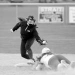 Sequim Gazette photo by Michael Dashiell / Sequim shortstop Hannah Bates, left, puts the tag on an Olympic runner in an April 13 league match-up in Sequim.