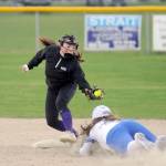 Sequim Gazette photo by Michael Dashiell / Sequim shortstop Hannah Bates, left, puts the tag on an Olympic runner in an April 13 league match-up in Sequim.