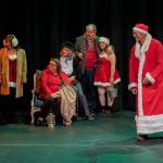 Sequim Gazette photo by Emily Matthiessen / From lfet to right, actors Merrin Packer, Jamie Pauley, Amy Henry, Cheryl Tamblyn, Ron Rager, Tara Dupont, Ken Burland and Cheryl DiPietro rehearse a Christmas Scene for Olympic Theatre Arts upcoming production Calendar Girls, scheduled to run from April 28 to May 14.
