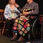 Sequim Gazette photo by Emily Matthiessen / Cheryl DiPietro and Ken Burland, playing married couple Annie and John in OTAs newest production Calendar Girls, share a private moment on the eve of his passing.