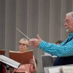 Sequim Gazette photo by Emily Matthiessen / Dr. Jerome Wright leads a Peninsula Singers rehearsal at Trinity United Methodist Church last week. Its Wrights ninth season with the Sequim-based choral group.