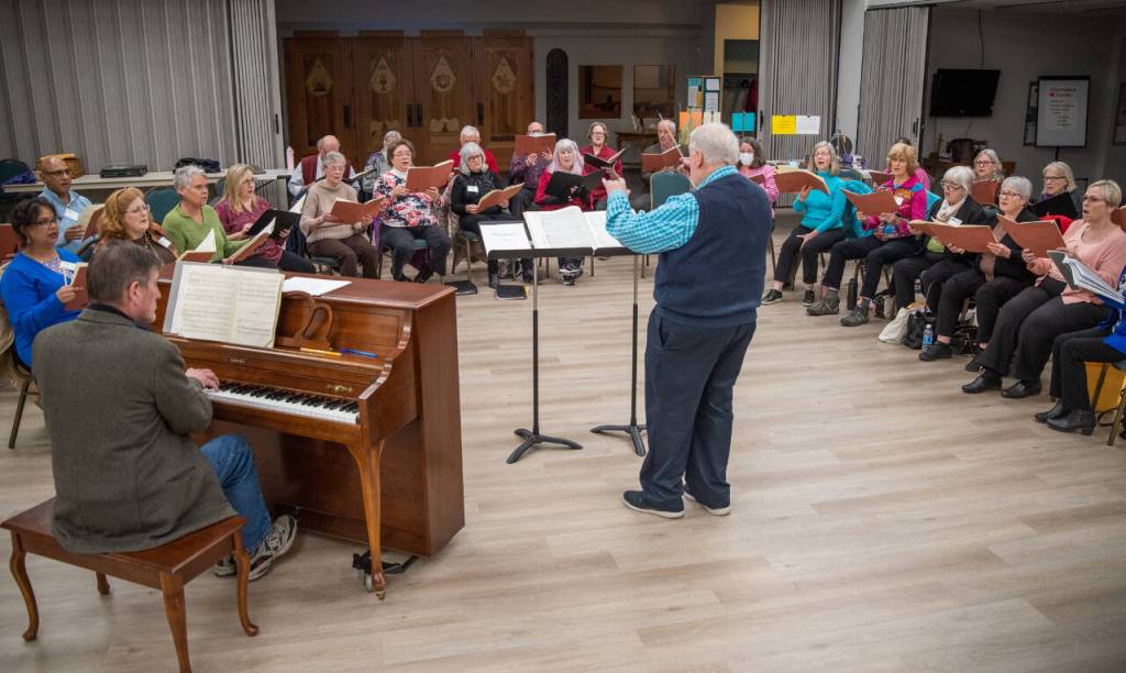 Sequim Gazette photo by Emily Matthiessen / Dr. Jerome Wright leads a Peninsula Singers rehearsal at Trinity United Methodist Church. The groups spring concerts are April 28 and 29.