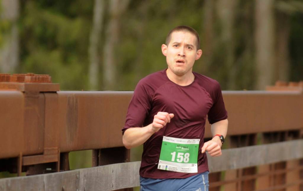 Sequim Gazette photo by Michael Dashiell / Justin Strait nears the finish line as he races to a 5k victory at the 2023 Railroad Bridge Run on April 22. Strait finished in 19:15, with runner-up C.J. Daniels finishing 24 seconds back.