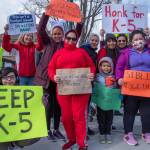 Sequim Gazette photo by Emily Matthiessen
More than 100 adults and children on April 17 protest the Sequim School Boards decision to reconfigure the districts two elementary schools. Sorayao Cogorno-Frutos (kneeling) said she attended Helen Haller Elementary School and would like children to have a similar K-5 grade-level experience.