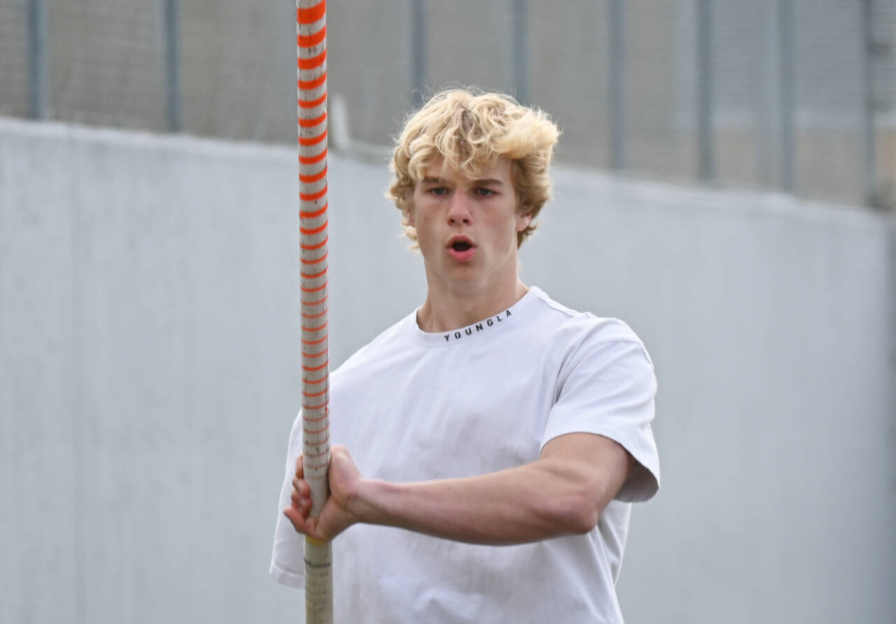 Sequim Gazette photo by Michael Dashiell
At left: Sequim High senior Mirek Skov eyes the pole vault pit at a practice last week. Skovs personal best in the event, 14 feet, is the top boys 2A mark this season.