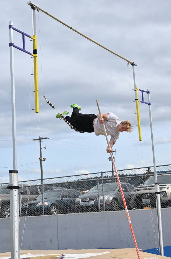 Sequim Gazette photo by Michael Dashiell / Sequim pole vaulter Mirek Skov looks to clear a height at a practice last week. Skov has the top state mark (14-0) among 2A boys this season.
