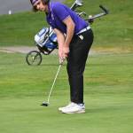 Sequim Gazette photos by Michael Dashiell
Sequims Lars Wiker watches as his putt attempt on the first hole at The Cedars at Dungeness on April 25 drops in the cup. Wiker shot a career-best 41, helping Sequim beat Olympic in the league match.