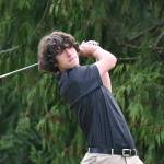 Sequim Gazette photo by Michael Dashiell / Sequims Cole Smithson watches a drive off the tee on the second hole at The Cedars at Dungeness on April 25, as the Wolves take on Olympic in a league match.