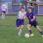 Sequim Gazette photo by EmilyMatthiessen / Sequims Nova Barrett, right, battles with North Kitsaps Harper Sabari for the ball in an Olympic League match-up in Sequim on April 25. North Kitsap shut out the Wolves, 2-0.