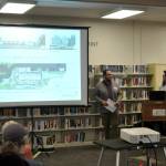 Sequim Gazette photo by Matthew Nash / Noah Glaude, NOLS executive director, top left, and Pia Westen, SHKS project lead, top right, answer questions on April 26 inside the Sequim Library about its planned renovation and expansion. Tentative plans have the project going to bid this fall and construction finishing in late 2024.