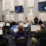Photo by Richard Greenway/Sequim City Band
Sequim City Band members assemble for their first rehearsal in the new rehearsal hall at the James Center. The hall features a high ceiling, acoustical tiles on the walls and wall-mounted monitors for displaying key information.