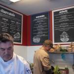Sequim Gazette photo by Emily Matthiessen / Chef Ted Walker and new hire John Shaack prepare food for customers under the menu of The Goat and the Radish.