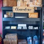 Sequim Gazette photo by Emily Matthiessen / The interior of The Goat and the Radish includes antique and modern picnic baskets, handmade items and custom snackle boxes.