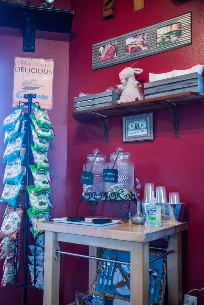 Sequim Gazette photo by Emily Matthiessen / The interior of The Goat and the Radish includes goat decorations, many snack options and antique picnic baskets.