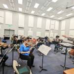 Photo courtesy of Sequim Community Orchestra / Conductor/music director Phil Morgan-Ellis leads a Sequim Community Orchestra rehearsal on April 25 at the Sequim City Band expanded rehearsal hall at the James Center for Performing Arts. The orchestra closes their 11th season with a free concert and bake sale at 7 p.m. on Saturday, May 13, at Trinity United Methodist Church.