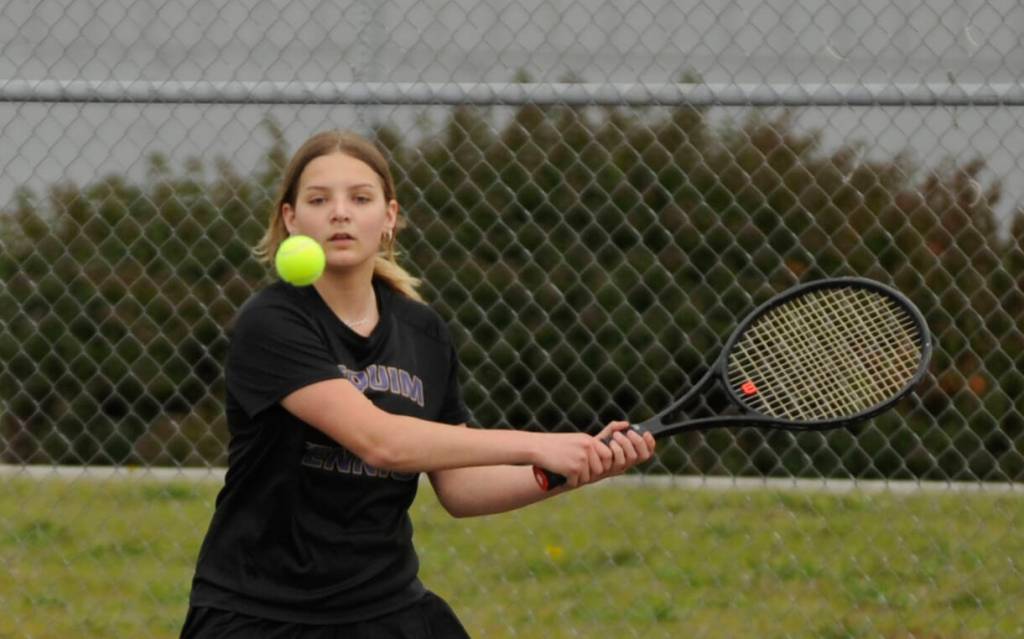 Sequim Gazette photo by Michael Dashiell
Sequims No. 2 singles player Calleigh Thompson returns a shot in a match against Olympic on April 21. Thompson took fifth place at last weeks Olympic League tournament.