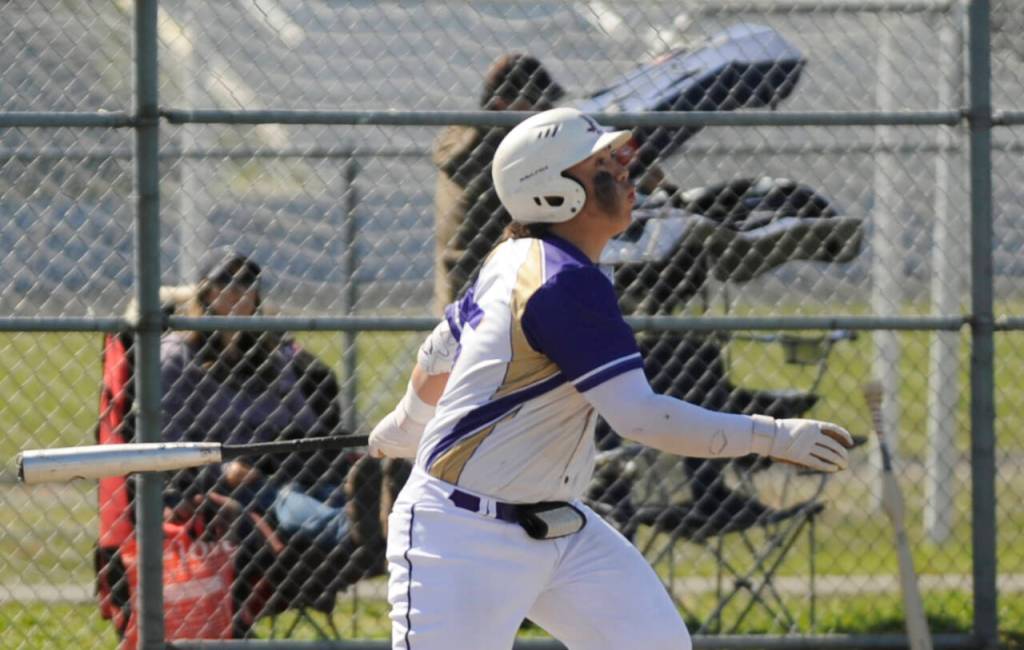 Sequim Gazette photo by Michael Dashiell / Sequims Ayden Holland watches a popup off his bat in the Wolves West Central District tournament match-up with Franklin Pierce on May 9.