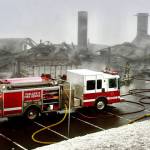 Photo by Jay Cline/Clallam County Fire District 2 / Firefighters from Clallam 2 Fire-Rescue and the Port Angeles Fire Department respond to a fire at the Olympic National Park Day Lodge on May 7.