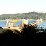 File photo by Brian McLean/Olympic Peninsula News Group / Traffic crosses the Hood Canal Bridge along state Highway 104 in April. State Department of Transportation crews begin permanent repairs to the bridge on Saturday.