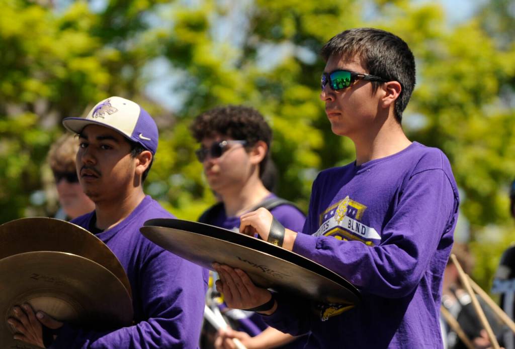 Sequim Gazette photo by Michael Dashiell / Sequim High School and Sequim Middle School band members entertain the crowd at the Sequim Irrigation Festival Grand Parade on Saturday, May 13.