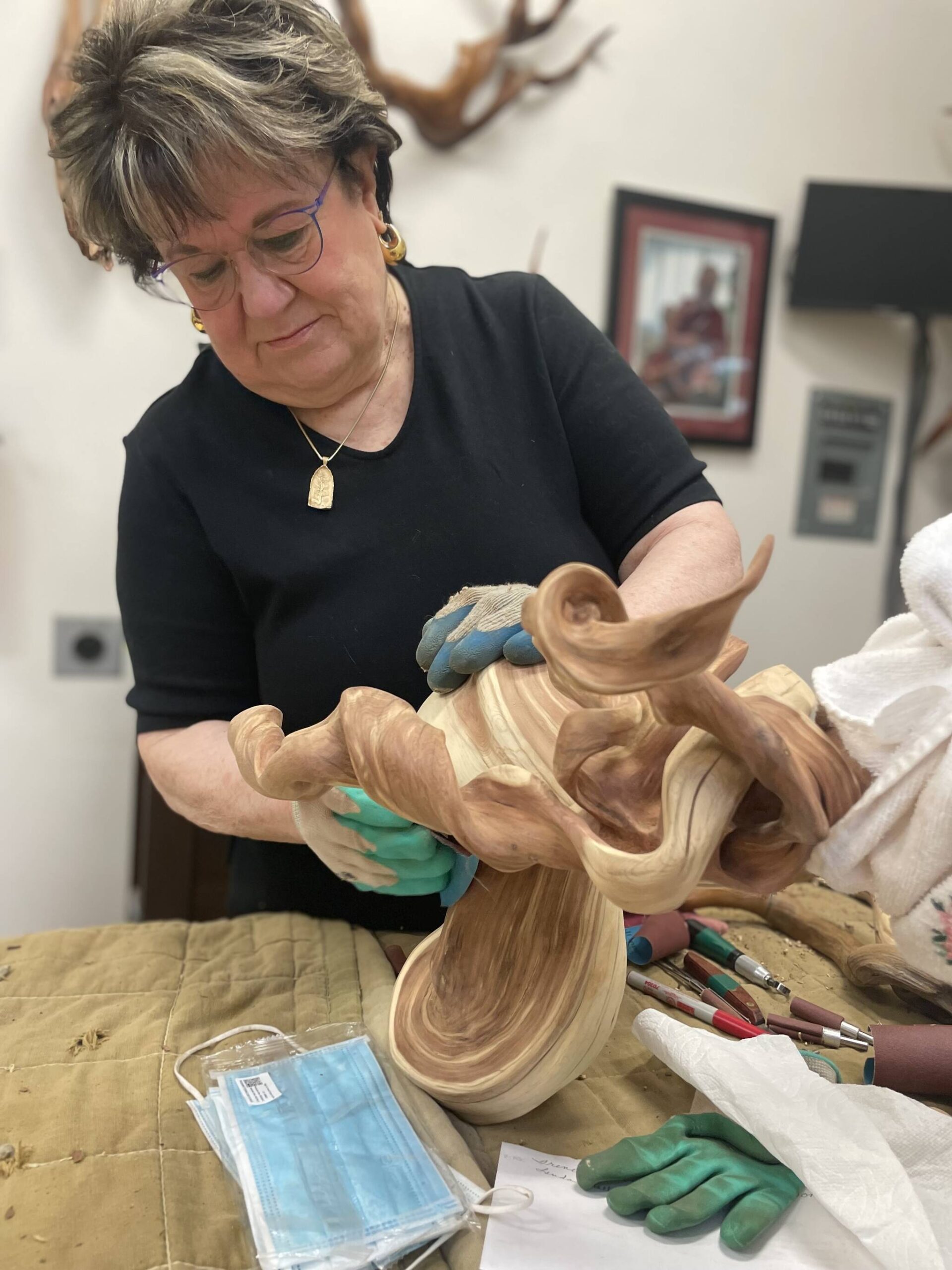 Sequim Gazette photo by Matthew Nash
Driftwood art instructor Tuttie Peetz continues to work on her driftwood art piece from her home studio for Olympic Driftwood Sculptors next show May 20-21 at the Dungeness River Nature Center. Shes put more than 1,000 hours into meticulously shaping the twisted juniper wood from Montana, she said.