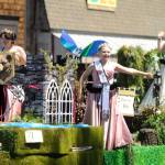 Sequim Gazette file photo by Michael Dashiell / Royalty from the McCleary Bear Festival say hello to the Sequim Irrigation Festival Grand Parade crowd on May 13. The entry took home the Mayors Award.