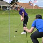 Sequim Gazette photo by Michael Dashiell / Sequims Carter Cronin lines up a putt on the fourth hole at The Cedars at Dungeness, in a league match against Olympic on April 26. Cronin earned a state tourney berth after winning a three-player playoff for the the West Central District tournament title on May 16 at The Cedars.