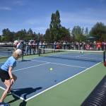 Sequim Gazette photos by Michael Dashiell
A crowd looks on as Abigail Berg returns a serve in a semifinal match in the Big Dill Fun Day tournament on May 20.