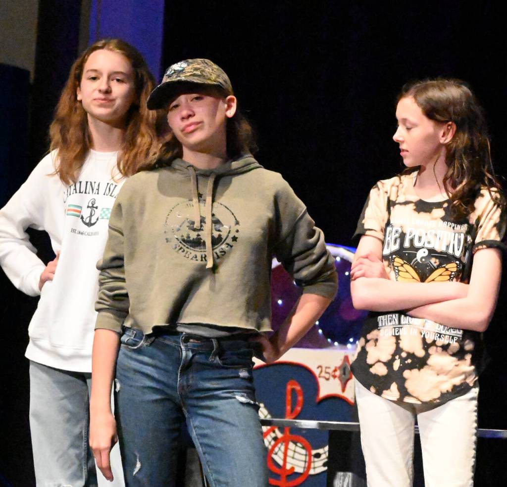 Sequim Gazette photo by Michael Dashiell / From left, Lexi Sterrett, Audrey Cabage and Addy Adams play spoilers in a scene from Olympic Peninsula Academys production of The Nifty Fifties.