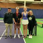 Photo courtesy of Mark Textor / At center, Sequim Highs Garrett Little and Kendall Hastings celebrate strong finishes at the class 2A state tennis tournament in Seattle on May 26. Little took second and Hastings placed third. Celebrating with them are head coach Mark Textor and assistant coach Andrea Dietzman.