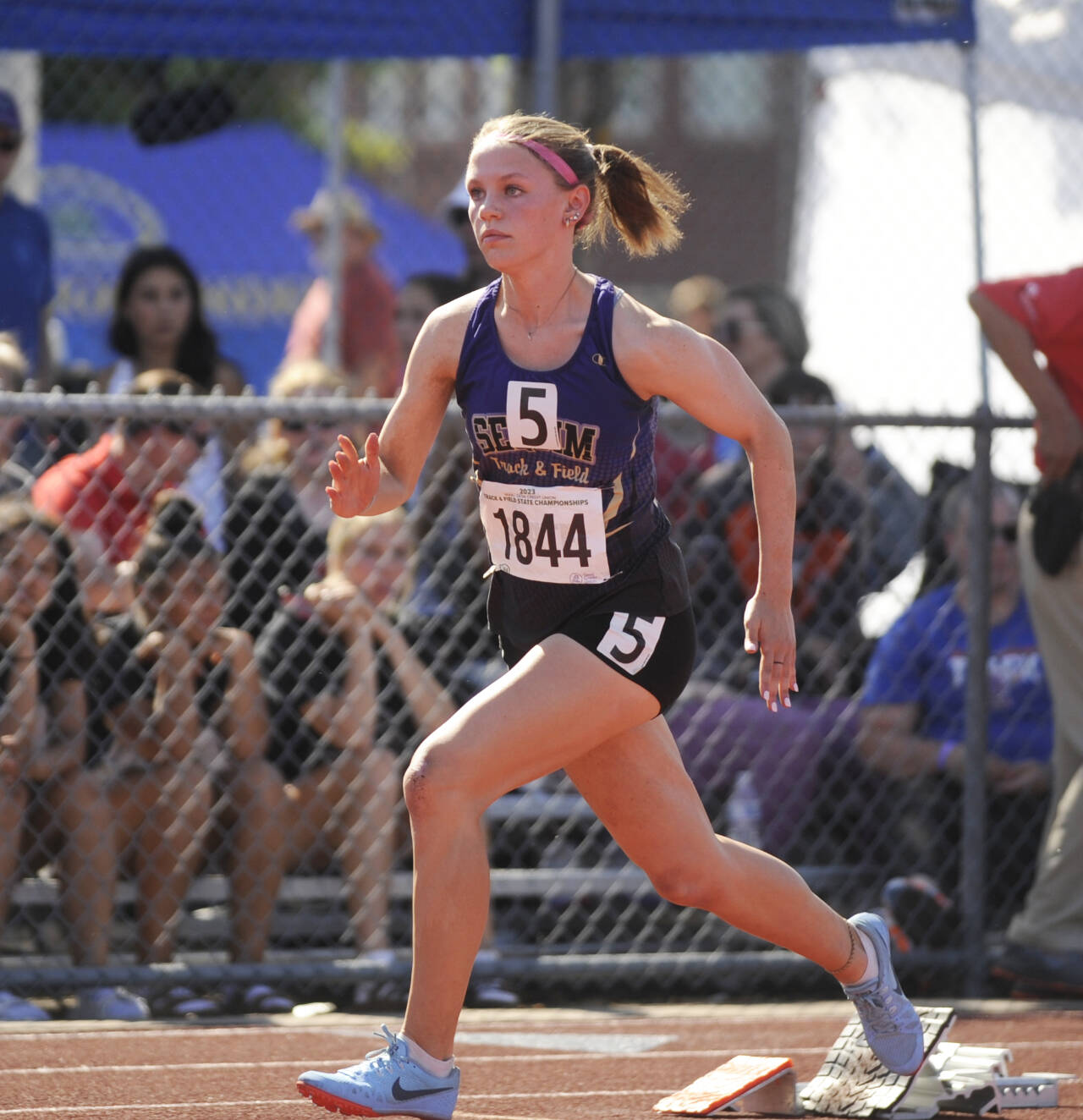 Sequim Gazette photo by Michael Dashiell
Sequim High sophomore Ivy Barrett breaks from the start in the 400-meter preliminaries at the Class 2A state meet in Tacoma on May 26. Barrett won her heat and, a day later, placed second in the finals in a personal best 59.43 seconds.