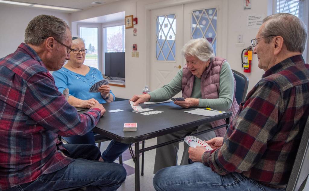 Sequim Gazette photo by Emily Matthiessen
From left: Bill Pampell, Sally Wheatley, Betty Sarty and Earl Karich play a hand of bridge at the Shipley Center. Karich leads the group that meets on Wednesdays, another group meets on the second and fourth Saturdays.
