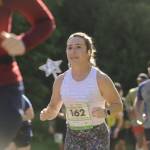 Sequim Gazette photo by Michael Dashiell / Skye Jensen of Port Angeles and other runners in the North Olympic Discovery Marathon reach the outskirts of Sequim on June 4.