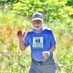 Photo by Jay Cline / Keith Northington, 84, of Sequim, races in the North Olympic Discovery Marathon on June 4. Northington finished in 7:18:02. The oldest runner in this years race, Northington cruised to a win in his age class (men 80-89).