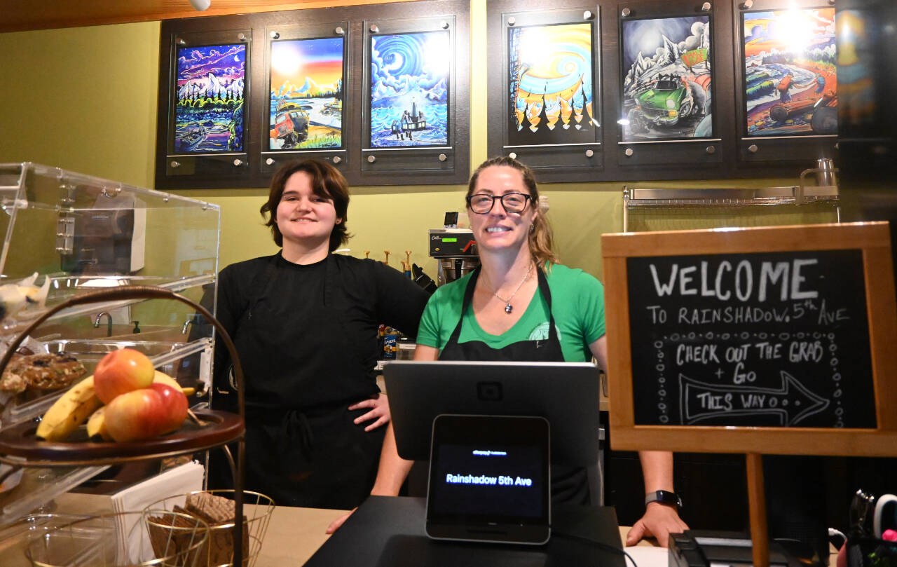 Sequim Gazette photo by Michael Dashiell 
Rainshadow Café owner Dominique Hall, right, joins staffer Emily Klein at Halls new eatery, Rainshadow at Fifth Avenue, last week. The second location opened in late May and offers many of the same culinary and coffee treats as the West Cedar Street location.