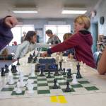 Ailo Saari and Emma Tran concentrate on their chess match during Five Acre School Chess Clubs end of the year tournament.