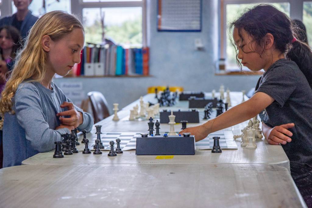 Sequim Gazette photo by Emily Matthiessen
Hoko Saari and Kazuki Feinstein concentrate on a match during Five Acres Chess Club end of the year tournament.