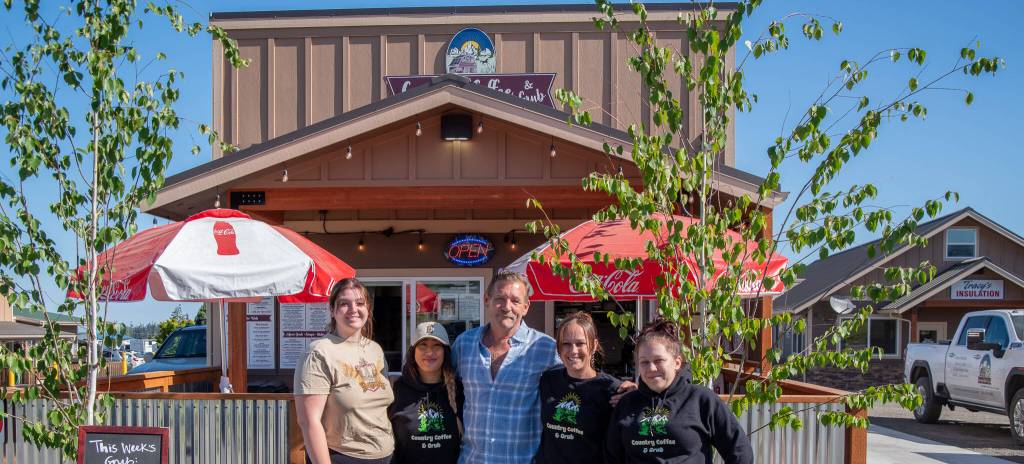 Sequim Gazette photos by Emily Matthiessen
Tracy Bloom, center, and employees from left to right: Grace Titterness, Tina Nguyen, Natalie Topham and Jessica Topham stand in front of newly opened Country Coffee and Grub in Sequim.